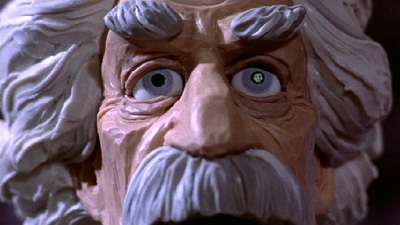 Now, honestly, is that or isn't it a face you can trust? Observe that classic profile - that bushy mustache - the death-mask in one eye... Hang on a second.